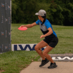 Pro Disc golfer teeing off at Idlewild